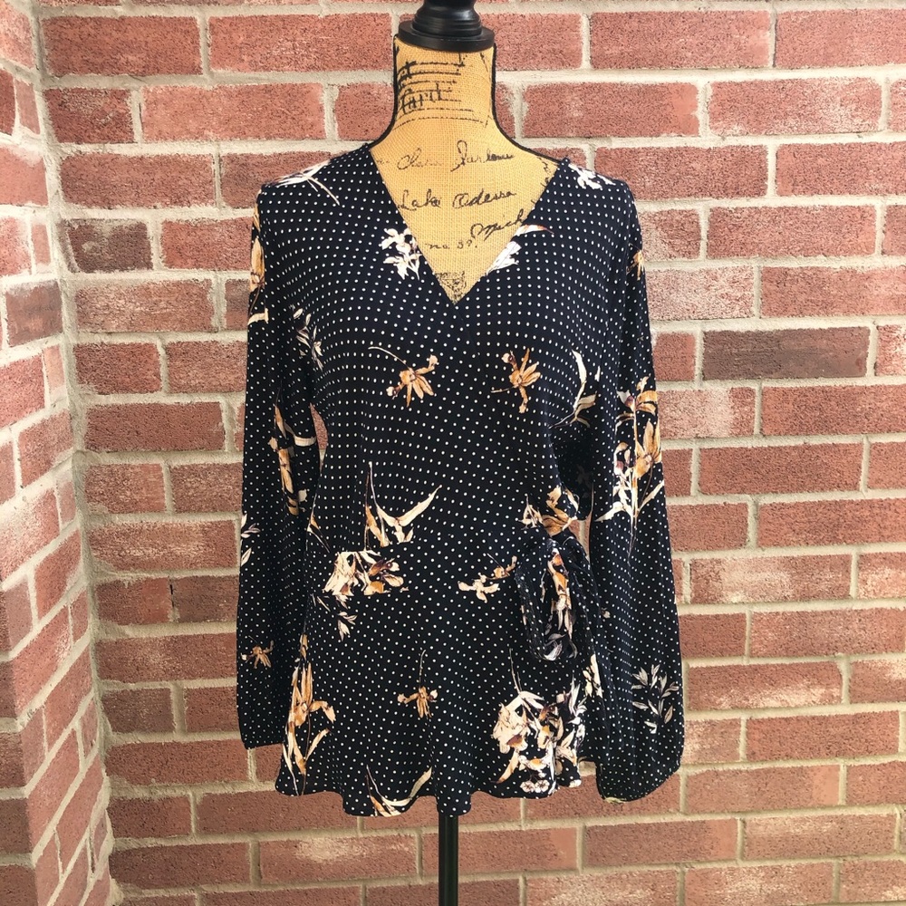 Polka dot and floral wrap blouse